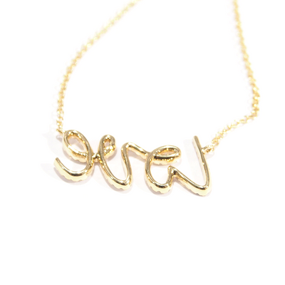 Love Necklaces. Yellow Gold and round Brilliant diamonds. Cursive Love Necklace. Made for Love Jewelry